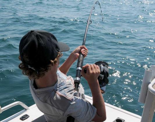 Gift cards for local charters, as well as rod-and-reel combos, make great Christmas presents.